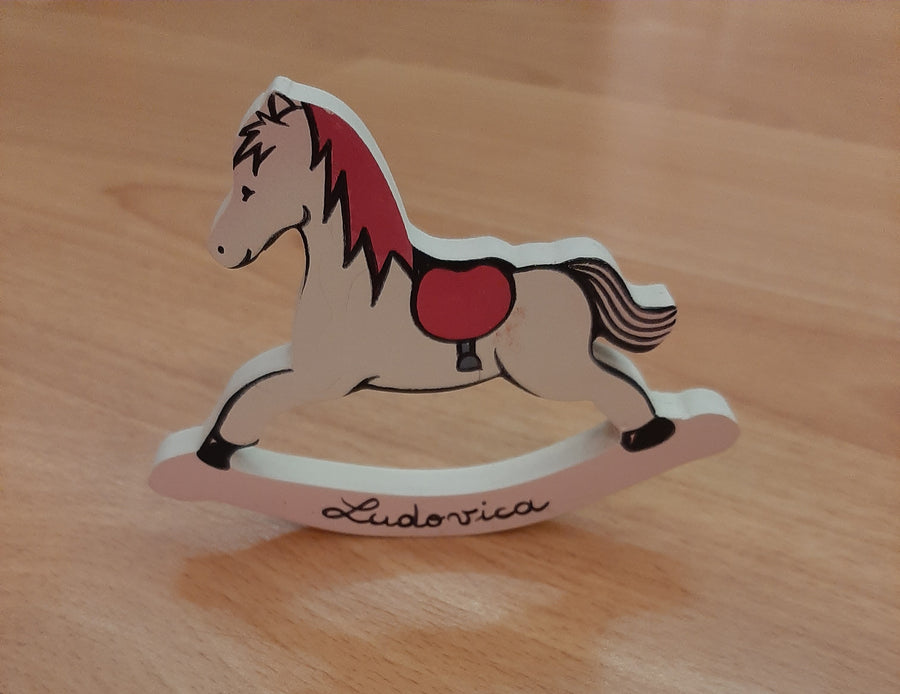 Bomboniere "cavalluccio a dondolo rosa "