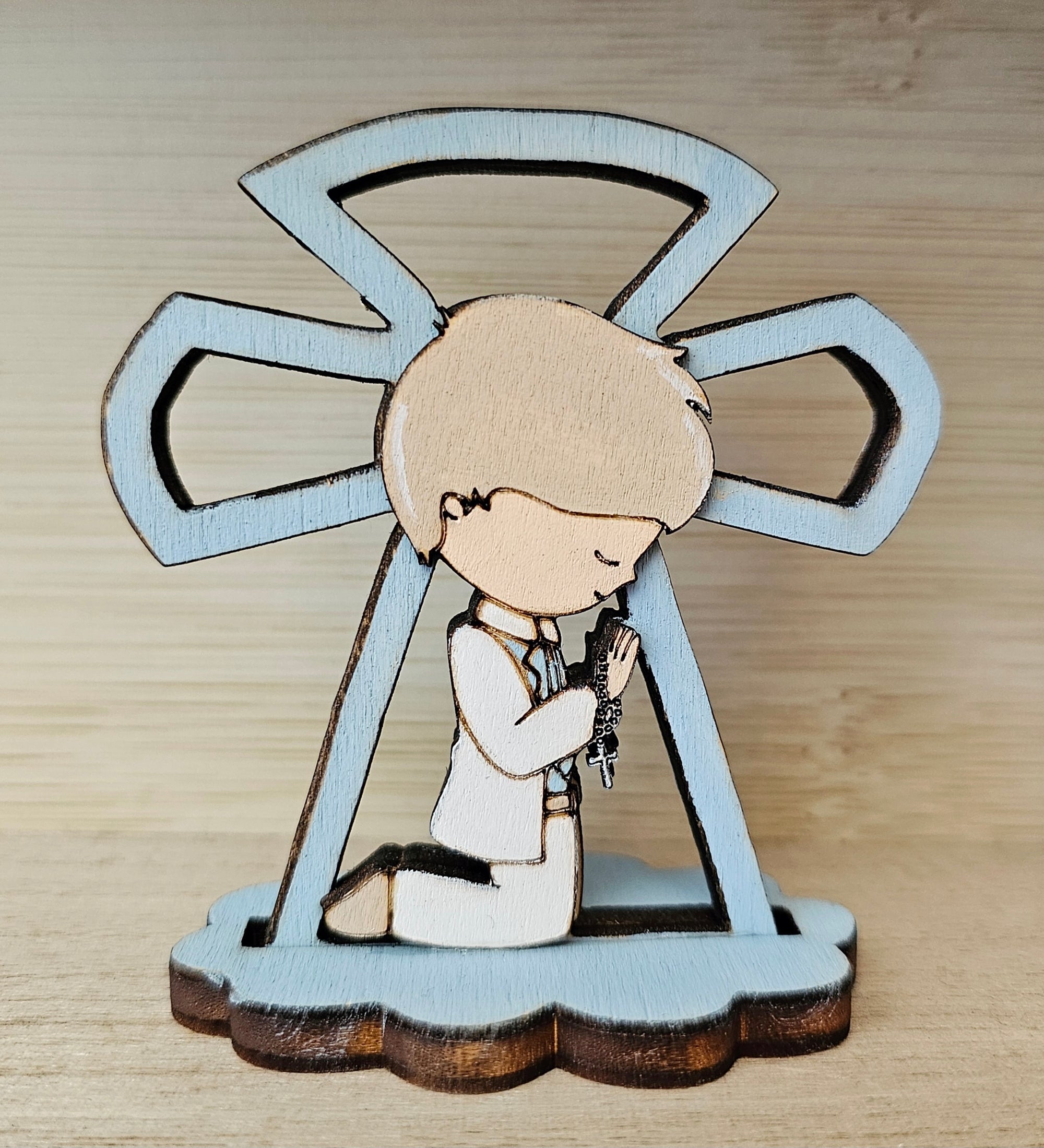 Bomboniere "bimbo con croce traforata"