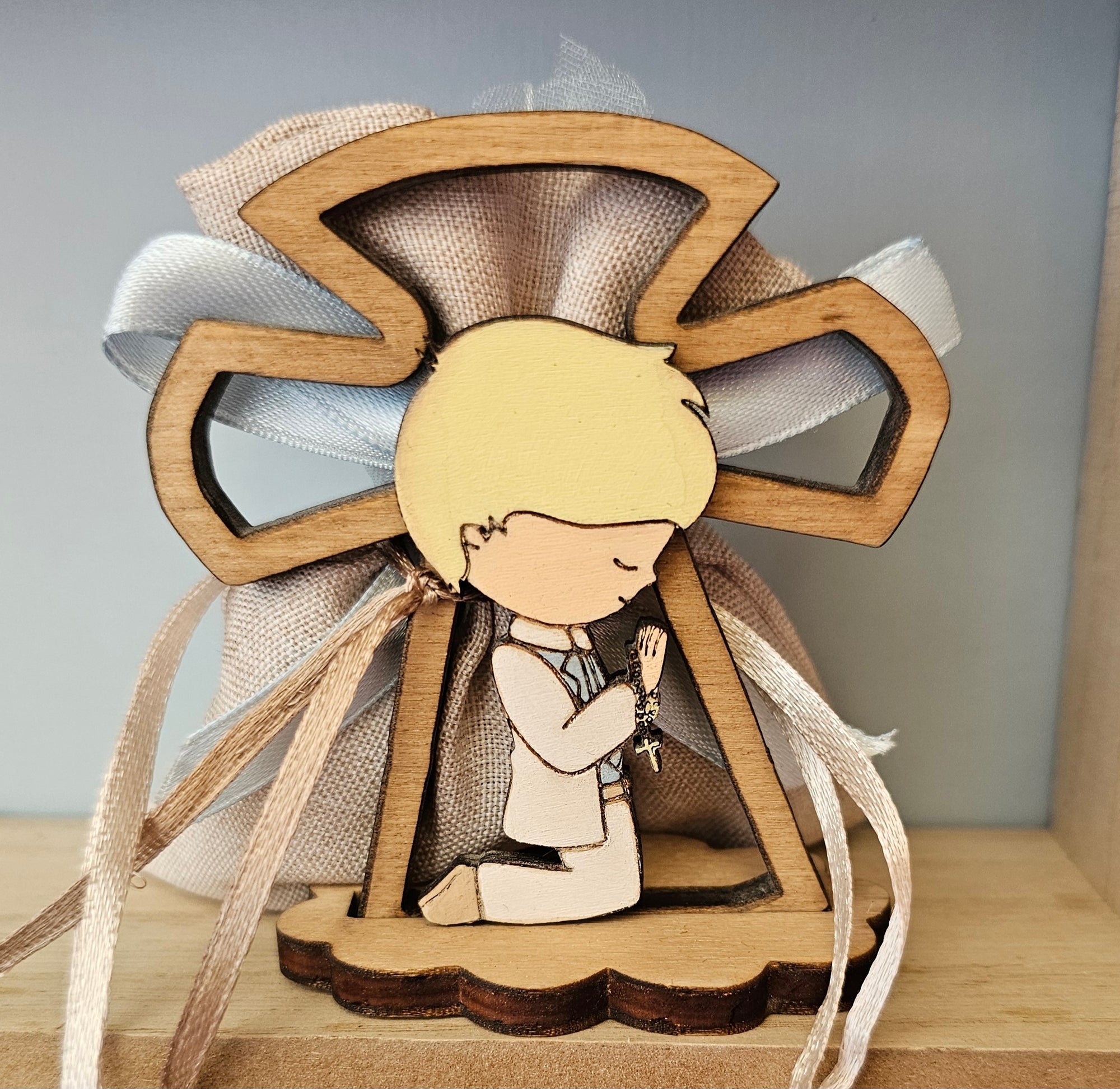 Bomboniere "bimbo con croce traforata"