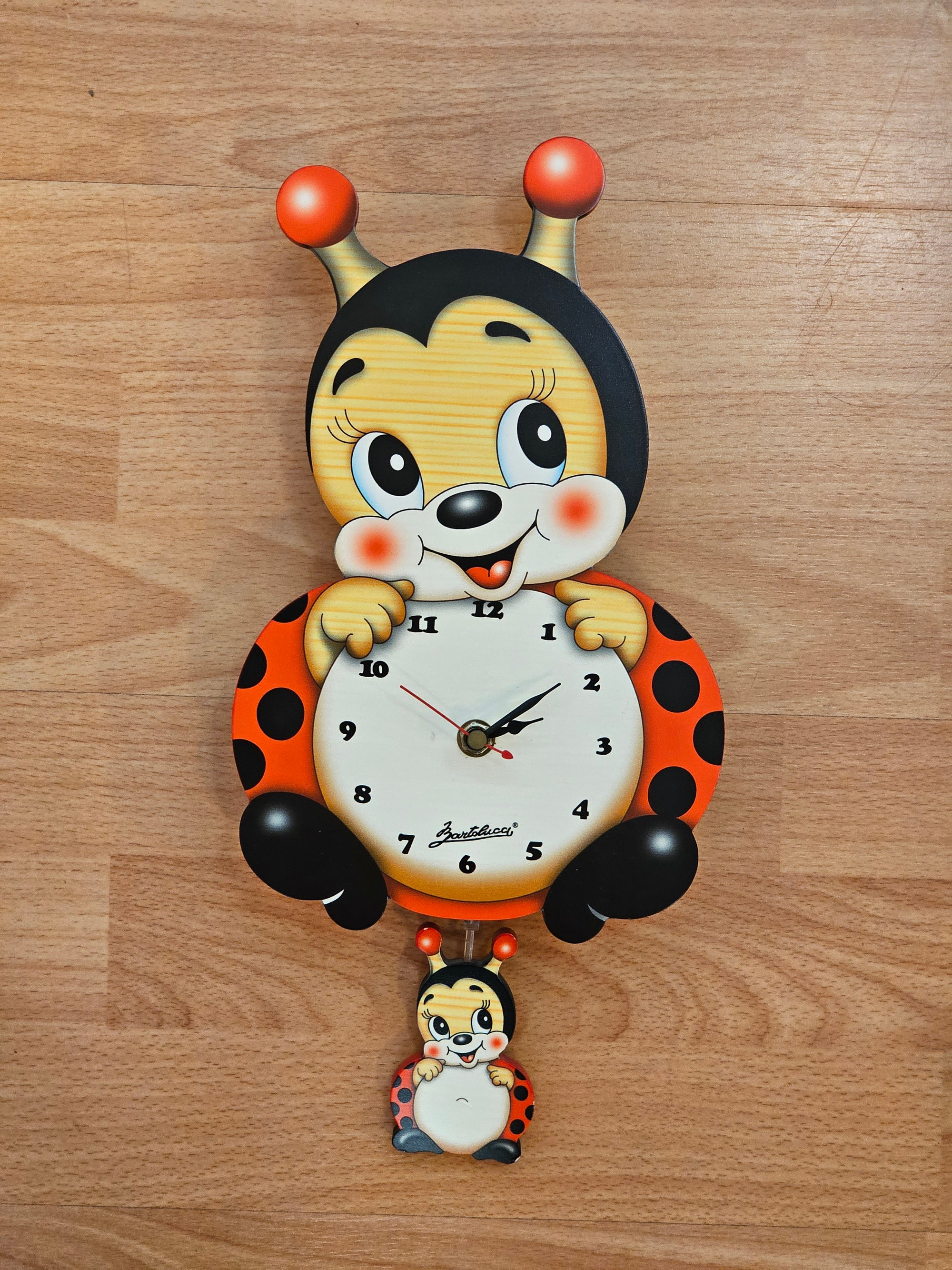 Orologio pendolo "coccinella"