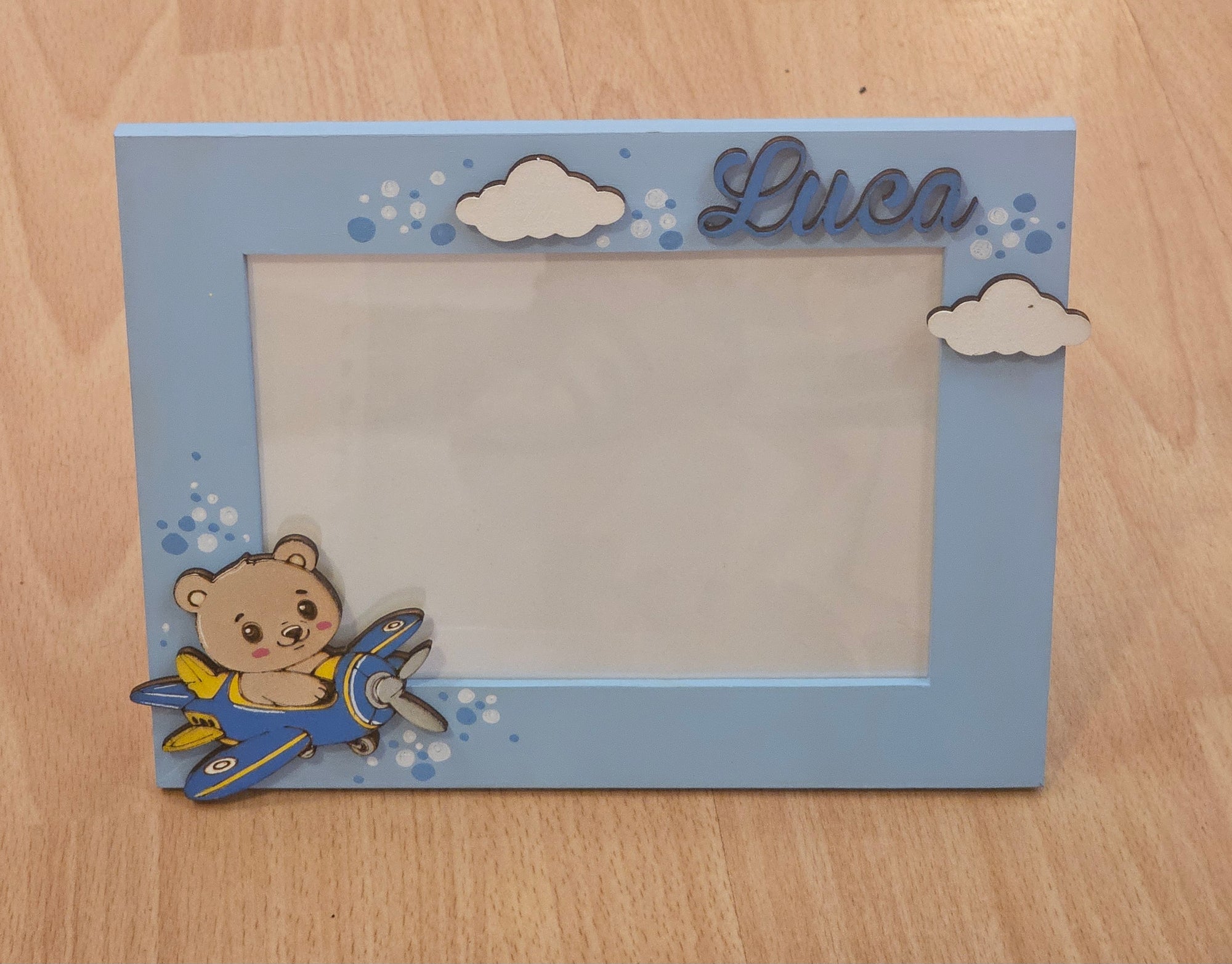 Cornice "orsetto su aereo"