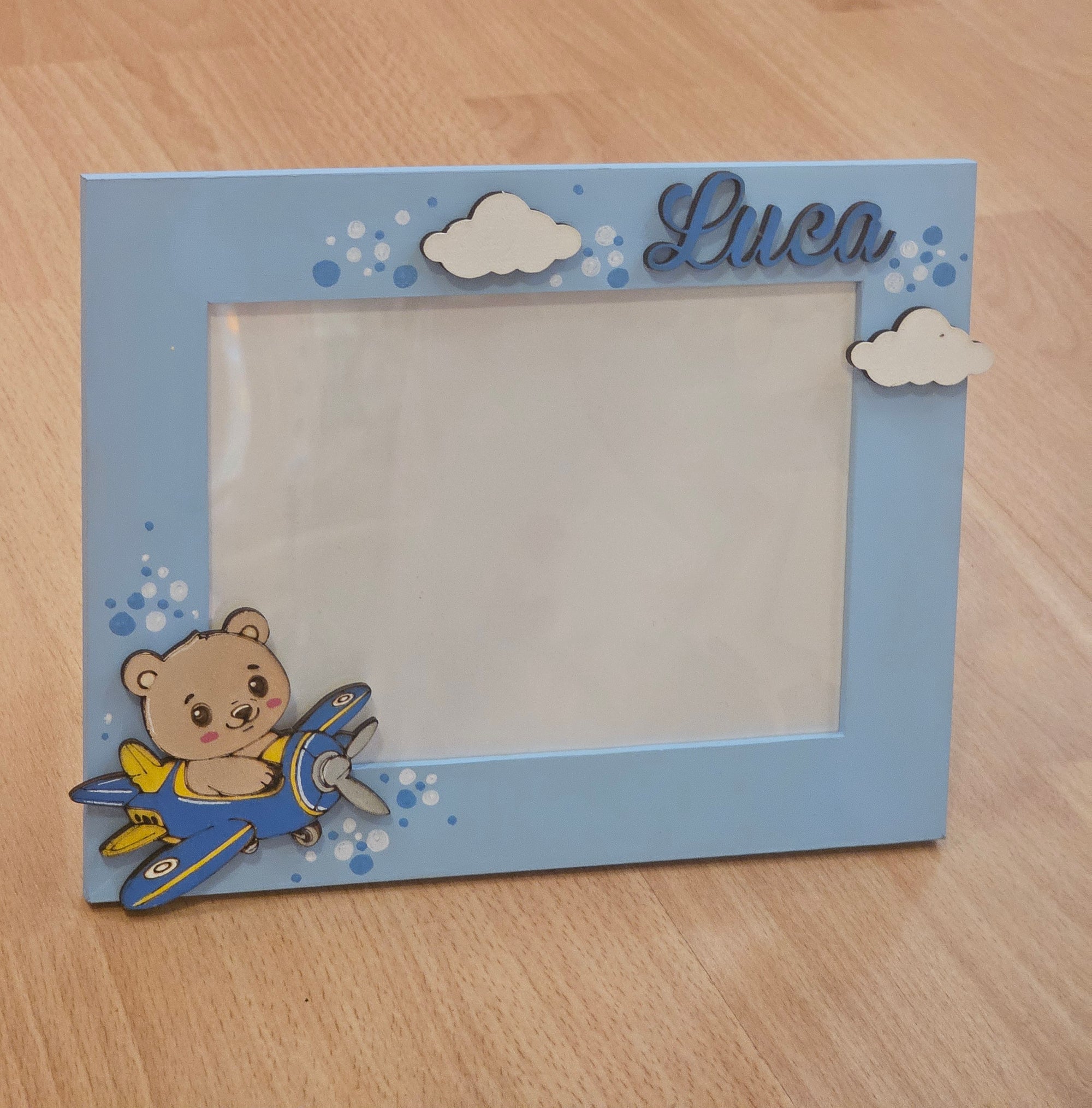 Cornice "orsetto su aereo"