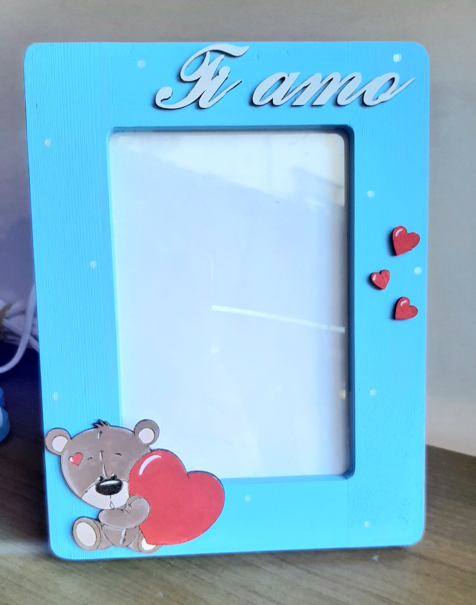 Cornice celeste con scritta ti amo